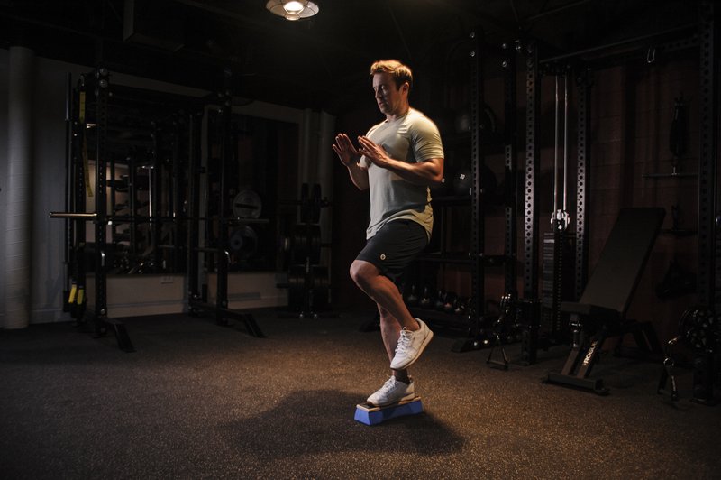 Youth ski camp training session with dryland fitness and ski simulator at Home Mountain in Los Angeles